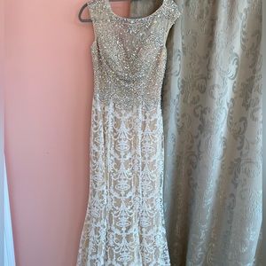 Selling Gigi Champagne Colored Gown
Beaded Top & Lace Nude
Bottom and Open Back